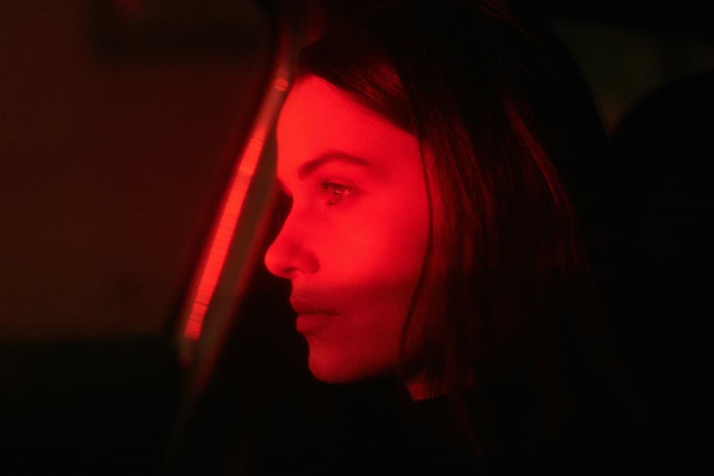 Red lit editorial portrait